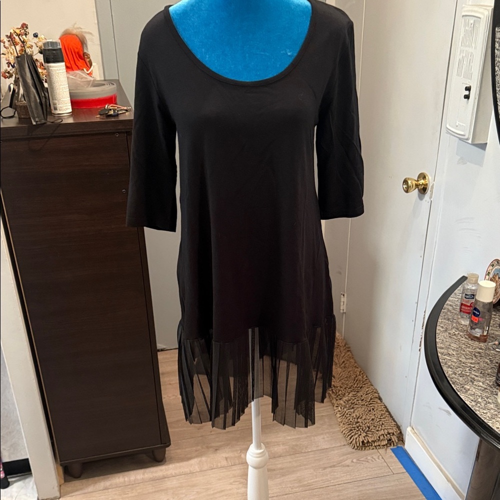 Chic Black Tunic with Sheer Hem